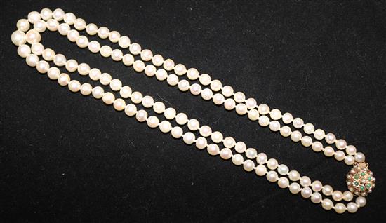 A double strand cultured pearl necklace with 9ct gold , turquoise and split pearl set clasp, 16.5in.